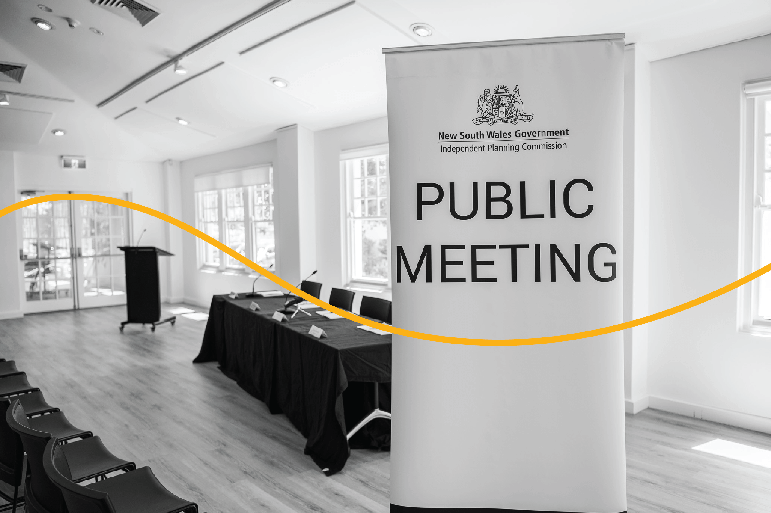 Public meeting banner with yellow